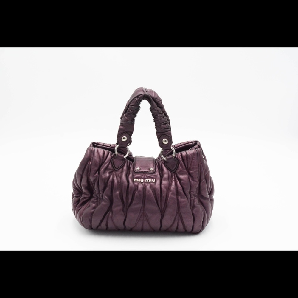 MIU MIU MATELASSÉ LEATHER IN PLUM OR BOYSENBERRY